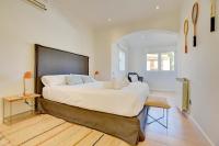 A bed or beds in a room at Villa Port Andratx by Slow Villas