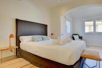 A bed or beds in a room at Villa Port Andratx by Slow Villas