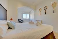 A bed or beds in a room at Villa Port Andratx by Slow Villas