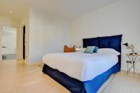 A bed or beds in a room at Villa Port Andratx by Slow Villas