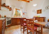 Kuchyň nebo kuchyňský kout v ubytování Villa Cas Frares by Slow Villas