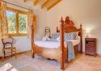 Postel nebo postele na pokoji v ubytování Villa Cas Frares by Slow Villas