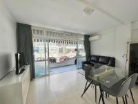 A television and/or entertainment centre at APARTMENT IN BENIDORM CITY CENTER