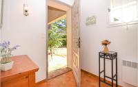 a hallway with a door leading to a yard at Beautiful Home In Entrechaux With 1 Bedrooms And Wifi in Entrechaux