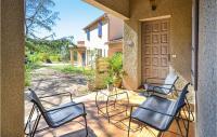 a group of chairs sitting on a patio at Beautiful Home In Entrechaux With 1 Bedrooms And Wifi in Entrechaux