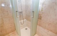 a shower with a glass door in a bathroom at Beautiful Home In Entrechaux With 1 Bedrooms And Wifi in Entrechaux