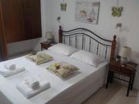 Posteľ alebo postele v izbe v ubytovaní Poseidon Studios Chania Center