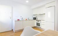 A kitchen or kitchenette at 3 Bedroom Cozy Apartment In Denia