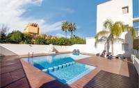 The swimming pool at or close to 3 Bedroom Cozy Apartment In Denia