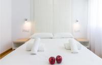 A bed or beds in a room at 3 Bedroom Cozy Apartment In Denia
