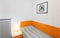 A bed or beds in a room at Casa Emilia 2
