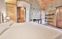 A bed or beds in a room at Vincenzo-Podere Moricci
