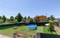 The swimming pool at or close to Cozy Apartment In Piano Di Mommio