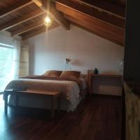 Posteľ alebo postele v izbe v ubytovaní Refugio playa Caldebarcos