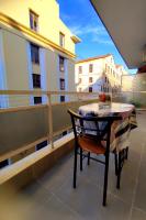 A balcony or terrace at DriftWood Center Apartment