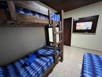 Hostel flor do Caribeにあるベッド