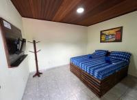 Hostel flor do Caribeにあるベッド