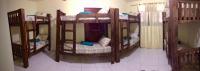 Hostel flor do Caribeにあるベッド