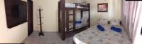 Hostel flor do Caribeにあるベッド