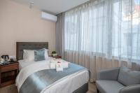 Łóżko lub łóżka w pokoju w obiekcie Willis Hotel Business & Wellness