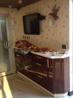 A television and/or entertainment centre at My Liva Hotel