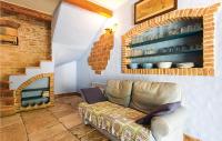Posedenie v ubytovaní Two-Bedroom Holiday Home In Krnica