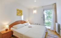 Posteľ alebo postele v izbe v ubytovaní Holiday Home Bajagic 90 With Outdoor Swimmingpool