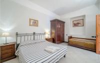 A bed or beds in a room at Mimosa