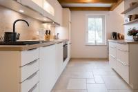 Kuchyň nebo kuchyňský kout v ubytování Ferienwohnung Strandgut Sonnenseite