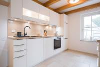 Kuchyň nebo kuchyňský kout v ubytování Ferienwohnung Strandgut Sonnenseite