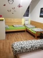 Postel nebo postele na pokoji v ubytování Apartmán Orbit