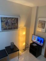 A television and/or entertainment centre at Ano Poli Studios 3