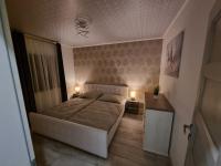 Postel nebo postele na pokoji v ubytování Apartmán Žora