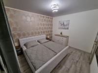 Postel nebo postele na pokoji v ubytování Apartmán Žora