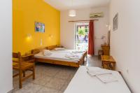 A bed or beds in a room at Julias Apartments