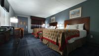 Ein Bett oder Betten in einem Zimmer der Unterkunft South Padre Island Inn