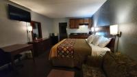 Ein Bett oder Betten in einem Zimmer der Unterkunft South Padre Island Inn