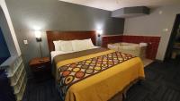 Ein Bett oder Betten in einem Zimmer der Unterkunft South Padre Island Inn
