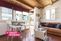 A seating area at Salomone Apartments II by Wonderful Italy
