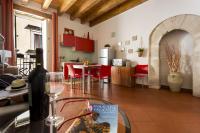 A seating area at Salomone Apartments II by Wonderful Italy