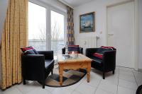 Posezení v ubytování Villa Augusta Wohnung 13