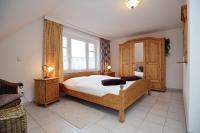 Postel nebo postele na pokoji v ubytování Villa Augusta Wohnung 13