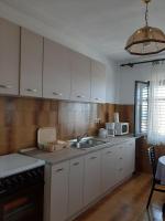 Kuchyň nebo kuchyňský kout v ubytování Apartments Grozdana