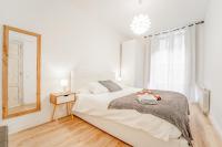 Postel nebo postele na pokoji v ubytování Residencial Villa Margarita