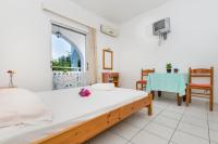 Posteľ alebo postele v izbe v ubytovaní Tassos & Marios Apartments I