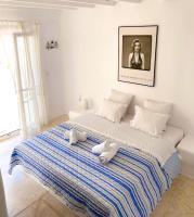 Posteľ alebo postele v izbe v ubytovaní Villa Viento of Mykonos