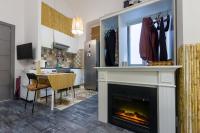 A television and/or entertainment centre at Social - kitchen home - apartment Madrid
