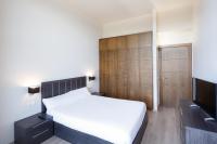 A bed or beds in a room at Apartamentos Masella 1600