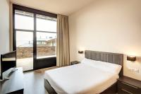 A bed or beds in a room at Apartamentos Masella 1600