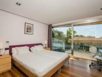 A bed or beds in a room at Belvilla by OYO Sammy